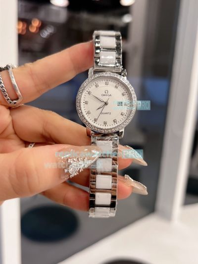 Omega Replica Ladies Watch White Dial Diamonds Bezel Ceramic steel Strap 28mm